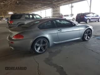 ✅ 2006 BMW M6 • VIN: WBSEH934X6B797428 • Lot: 63462135. Wystawiony na Copart z przebiegiem 73 393 mil. Bezpłatny archiwum sprzedaży aukcyjnych z USA i szczegółowy raport historii pojazdu na DreamBid. Zdjęcie 3.