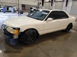 ✅ 1998 Acura RL • VIN: JH4KA9640WC012384 • Лот: 84588355. Опубликован ранее на Copart с пробегом 223 344 миль. Бесплатный доступ к архиву аукционных продаж из США и подробный отчёт об истории автомобиля на DreamBid. Изображение 1.