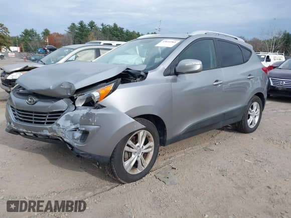 2012 Hyundai Tucson GLS with VIN KM8JU3AC3CU455825, listed as a IAAI auction lot 43611561 with 182,582 mi miles and . Bid and sale history available at DreamBid. Image 2.