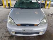✅ 2003 Ford Focus ZX3 • VIN: 3FAFP31Z53R143511 • Lot: 43782068. Listed on IAAI with Not provided. Free auction sales archive from the USA and detailed vehicle history report at DreamBid. Image 12.