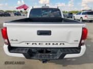 ✅ 2023 Toyota Tacoma SR • VIN: 3TYCZ5AN6PT161474 • Lot: 84927275. Listed on Copart with 56,587 mi. Free auction sales archive from the USA and detailed vehicle history report at DreamBid. Image 6.