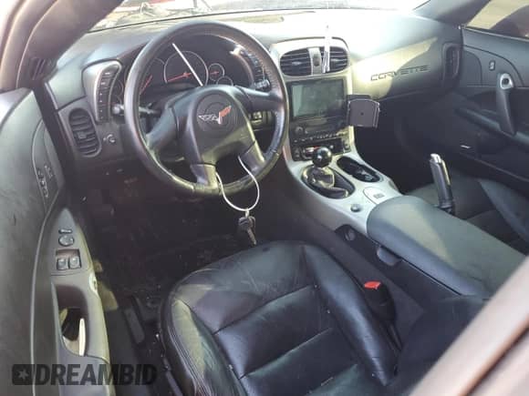 2005 Chevrolet Corvette with VIN 1G1YY24U055117293, listed as a Copart auction lot 74013514 with Not provided miles and Salvage title. Bid and sale history available at DreamBid. Image 8.