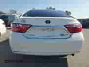 2016 Toyota Camry LE с VIN 4T1BD1FK0GU188173, выставлен на аукционе Copart как лот 71310655 с пробегом 141 413 миль миль и Списание • Salvage title. История ставок и продаж доступна на DreamBid. Изображение 6.