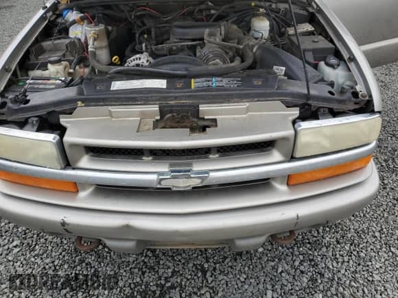 2004 Chevrolet Blazer LS z VIN 1GNCT18X64K116994, wystawiony jako Copart lot #79646694 z przebiegiem 222 831 mil mil oraz Szkoda całkowita • Salvage title. Historia ofert i sprzedaży dostępna na DreamBid. Obrazek 13.