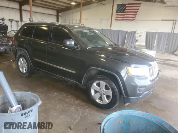✅ 2011 Jeep Grand Cherokee Laredo • VIN: 1J4RR4GG3BC714014 • Lot: 61985655. Listed on Copart with 178,044 mi. Free auction sales archive from the USA and detailed vehicle history report at DreamBid. Image 4.