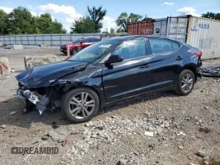 ✅ 2018 Hyundai Elantra Value Edition • VIN: 5NPD84LFXJH313028 • Lot: 86623865. Listed on Copart with 142,453 mi. Free auction sales archive from the USA and detailed vehicle history report at DreamBid. Image 1.