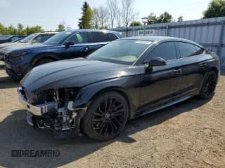 ✅ 2024 Audi RS 5 Sportback • VIN: WUAAWCF55RA901561 • Лот: 63903085. Опубликован ранее на Copart с пробегом 23 318 миль. Бесплатный доступ к архиву аукционных продаж из США и подробный отчёт об истории автомобиля на DreamBid. Изображение 1.
