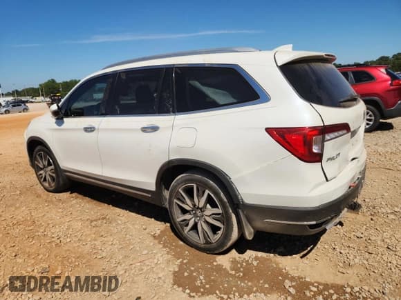 ✅ 2019 Honda Pilot Touring 8-Passenger • VIN: 5FNYF5H96KB015396 • Lot: 70816345. Listed on Copart with 108,095 mi. Free auction sales archive from the USA and detailed vehicle history report at DreamBid. Image 2.