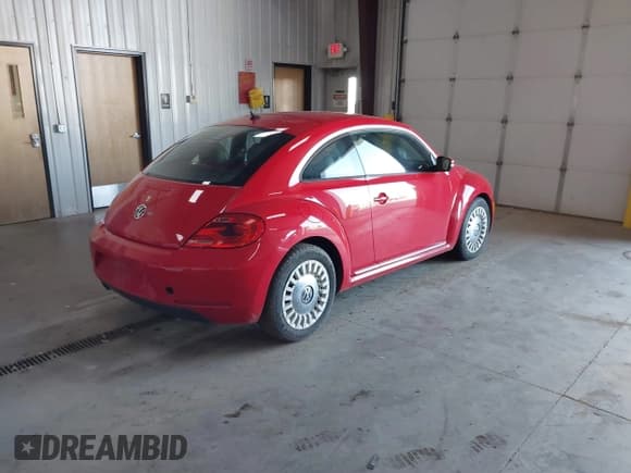 ✅ 2013 Volkswagen Beetle Fender Edition • VIN: 3VWJP7AT0DM693217 • Lot: 40677068. Listed on IAAI with 78,382 mi. Free auction sales archive from the USA and detailed vehicle history report at DreamBid. Image 4.