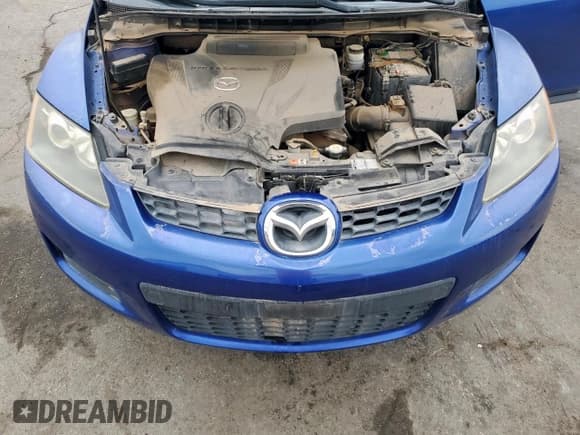 ✅ 2007 Mazda CX-7 Grand Touring • VIN: JM3ER293570119328 • Лот: 71736745. Опубликован ранее на Copart с пробегом 139 131 миль. Бесплатный доступ к архиву аукционных продаж из США и подробный отчёт об истории автомобиля на DreamBid. Изображение 12.