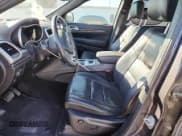 ✅ 2016 Jeep Grand Cherokee Overland • VIN: 1C4RJFCM1GC377936 • Лот: 81449065. Опубликован ранее на Copart с пробегом 120 309 миль. Бесплатный доступ к архиву аукционных продаж из США и подробный отчёт об истории автомобиля на DreamBid. Изображение 7.