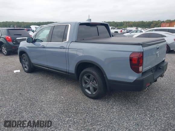 ✅ 2023 Honda Ridgeline RTL • VIN: 5FPYK3F5XPB067693 • Lot: 43179943. Listed on IAAI with 29,097 mi. Free auction sales archive from the USA and detailed vehicle history report at DreamBid. Image 3.