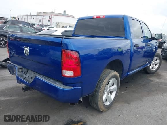 ✅ 2015 Ram 1500 Express • VIN: 1C6RR6KG0FS762887 • Lot: 42047359. Listed on IAAI with 146,963 mi. Free auction sales archive from the USA and detailed vehicle history report at DreamBid. Image 4.