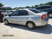✅ 2004 Kia Spectra GS • VIN: KNAFB161945141309 • Lot: 52395445. Listed on Copart with 99,100 mi. Free auction sales archive from the USA and detailed vehicle history report at DreamBid. Image 2.