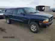2002 Dodge Dakota z VIN 1B7GG32X12S601124, wystawiony jako Copart lot #85401325 z przebiegiem 172 777 mil mil oraz Czysty tytuł • Clean title. Historia ofert i sprzedaży dostępna na DreamBid. Obrazek 4.
