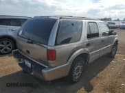 ✅ 2001 Oldsmobile Bravada • VIN: 1GHDT13W712220119 • Лот: 62089195. Опубликован ранее на Copart с пробегом 176 979 миль. Бесплатный доступ к архиву аукционных продаж из США и подробный отчёт об истории автомобиля на DreamBid. Изображение 3.