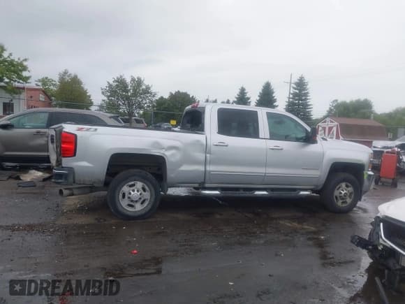 ✅ 2016 Chevrolet Silverado 2500HD LT • VIN: 1GC1KVE8XGF222868 • Lot: 43004596. Listed on IAAI with 93,976 mi. Free auction sales archive from the USA and detailed vehicle history report at DreamBid. Image 13.