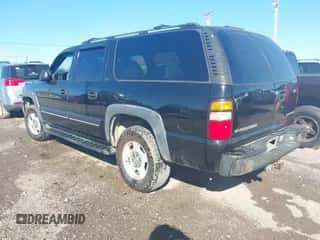 2001 Chevrolet Suburban LT z VIN 3GNEC16T21G213590, wystawiony jako IAAI lot #43454686 z przebiegiem 360 495 mil mil oraz . Historia ofert i sprzedaży dostępna na DreamBid. Obrazek 3.