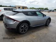 ✅ 2023 Kia EV6 Wind • VIN: KNDC3DLC0P5122467 • Лот: 61112594. Опубликован ранее на Copart с пробегом 9 645 миль. Бесплатный доступ к архиву аукционных продаж из США и подробный отчёт об истории автомобиля на DreamBid. Изображение 3.