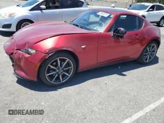 ✅ 2021 Mazda MX-5 Miata Grand Touring • VIN: JM1NDAM71M0454349 • Lot: 63943075. Wystawiony na Copart z przebiegiem 42 078 mil. Bezpłatny archiwum sprzedaży aukcyjnych z USA i szczegółowy raport historii pojazdu na DreamBid. Zdjęcie 1.