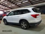 ✅ 2017 Honda Pilot EX-L • VIN: 5FNYF6H84HB044305 • Lot: 90472375. Wystawiony na Copart z przebiegiem 207 946 mil. Bezpłatny archiwum sprzedaży aukcyjnych z USA i szczegółowy raport historii pojazdu na DreamBid. Zdjęcie 2.