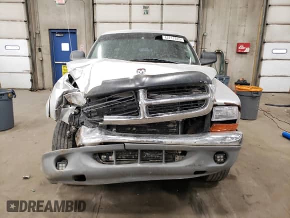 2004 Dodge Dakota Sport с VIN 1D7HG38N34S508009, выставлен на аукционе Copart как лот 42217205 с пробегом 168 446 миль миль и Списание • Salvage title. История ставок и продаж доступна на DreamBid. Изображение 5.