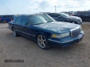 ✅ 1997 Lincoln Town Car Executive • VIN: 1LNLM81W9VY699703 • Lot: 40834899. Wystawiony na IAAI z przebiegiem 198 288 mil. Bezpłatny archiwum sprzedaży aukcyjnych z USA i szczegółowy raport historii pojazdu na DreamBid. Zdjęcie 1.