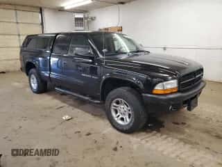2002 Dodge Dakota Sport z VIN 1B7GG32N92S563589, wystawiony jako Copart lot #79580194 z przebiegiem 110 736 mil mil oraz Czysty tytuł • Clean title. Historia ofert i sprzedaży dostępna na DreamBid. Obrazek 4.