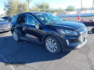 ✅ 2021 Ford Escape Titanium Hybrid • VIN: 1FMCU0DZ0MUB03021 • Lot: 43525786. Listed on IAAI with 50,787 mi. Free auction sales archive from the USA and detailed vehicle history report at DreamBid. Image 1.
