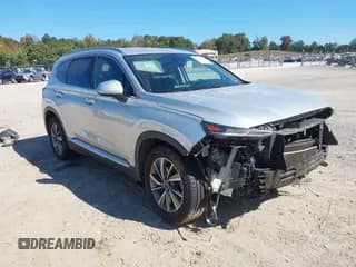 ✅ 2019 Hyundai Santa Fe SEL • VIN: 5NMS33AD7KH059780 • Lot: 43417803. Listed on IAAI with 135,740 mi. Free auction sales archive from the USA and detailed vehicle history report at DreamBid. Image 1.