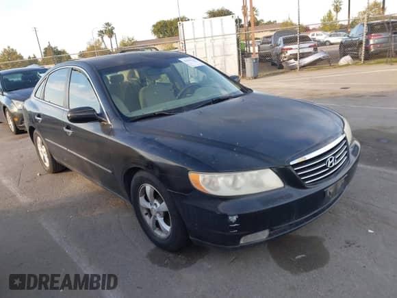 2006 Hyundai Azera SE with VIN KMHFC46F56A114031, listed as a IAAI auction lot 43610131 with 119,506 mi miles and . Bid and sale history available at DreamBid. Image 1.