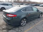 ✅ 2016 Ford Fusion Titanium • VIN: 3FA6P0K92GR135594 • Lot: 43749043. Listed on IAAI with 195,125 mi. Free auction sales archive from the USA and detailed vehicle history report at DreamBid. Image 4.