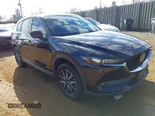 ✅ 2018 Mazda CX-5 Touring • VIN: JM3KFBCM4J0300781 • Lot: 43789902. Listed on IAAI with 82,833 mi. Free auction sales archive from the USA and detailed vehicle history report at DreamBid. Image 1.