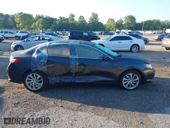 ✅ 2016 Acura ILX • VIN: 19UDE2F34GA007619 • Лот: 42996628. Опубликован ранее на IAAI с пробегом 97 456 миль. Бесплатный доступ к архиву аукционных продаж из США и подробный отчёт об истории автомобиля на DreamBid. Изображение 13.