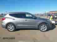 2015 Hyundai Santa Fe z VIN 5XYZWDLA9FG240216, wystawiony jako IAAI lot #43616955 z przebiegiem 203 691 mil mil oraz . Historia ofert i sprzedaży dostępna na DreamBid. Obrazek 13.