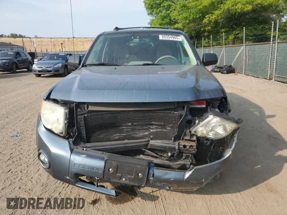 ✅ 2012 Ford Escape Hybrid • VIN: 1FMCU5K32CKB05830 • Lot: 59354905. Wystawiony na Copart z przebiegiem 59 505 mil. Bezpłatny archiwum sprzedaży aukcyjnych z USA i szczegółowy raport historii pojazdu na DreamBid. Zdjęcie 5.