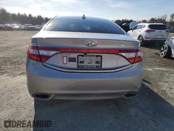 2013 Hyundai Azera с VIN KMHFG4JGXDA240841, выставлен на аукционе Copart как лот 82084474 с пробегом 168 746 миль миль и Списание • Salvage title. История ставок и продаж доступна на DreamBid. Изображение 6.
