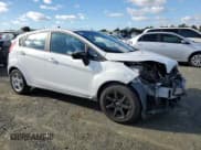 ✅ 2019 Ford Fiesta SE • VIN: 3FADP4EJ6KM156197 • Lot: 93041985. Listed on Copart with 96,596 mi. Free auction sales archive from the USA and detailed vehicle history report at DreamBid. Image 4.