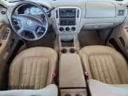 ✅ 2004 Mercury Mountaineer Convenience • VIN: 4M2ZU66KX4UJ21439 • Lot: 80073645. Listed on Copart with 153,692 mi. Free auction sales archive from the USA and detailed vehicle history report at DreamBid. Image 8.