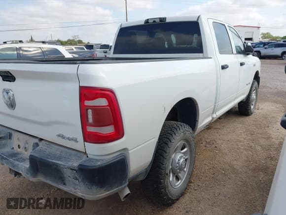 ✅ 2022 Ram 2500 Tradesman • VIN: 3C6UR5CJ4NG203881 • Lot: 42513409. Listed on IAAI with 138,265 mi. Free auction sales archive from the USA and detailed vehicle history report at DreamBid. Image 4.