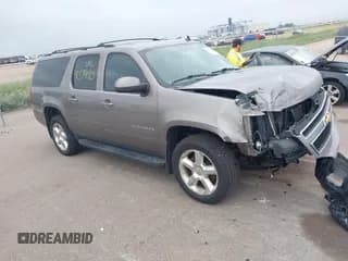 ✅ 2012 Chevrolet Suburban LT • VIN: 1GNSKJE71CR309191 • Lot: 42574060. Listed on IAAI with 198,988 mi. Free auction sales archive from the USA and detailed vehicle history report at DreamBid. Image 1.