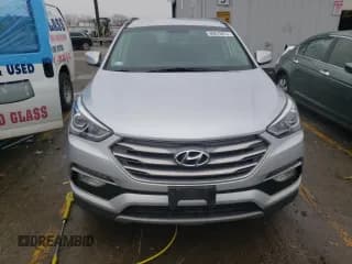 ✅ 2017 Hyundai Santa Fe 2.4L • VIN: 5XYZU3LB9HG426334 • Лот: 69870912. Опубликован ранее на Copart с пробегом 54 341 миль. Бесплатный доступ к архиву аукционных продаж из США и подробный отчёт об истории автомобиля на DreamBid. Изображение 5.