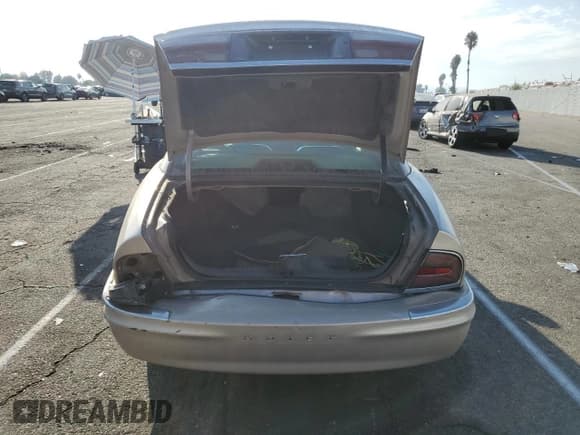 ✅ 1999 Buick Park Avenue • VIN: 1G4CW52K6X4653731 • Lot: 72736444. Wystawiony na Copart z przebiegiem 128 471 mil. Bezpłatny archiwum sprzedaży aukcyjnych z USA i szczegółowy raport historii pojazdu na DreamBid. Zdjęcie 6.