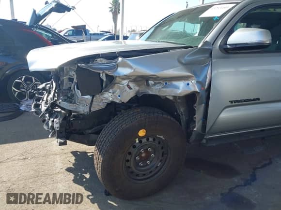 2022 Toyota Tacoma SR5 with VIN 3TMAZ5CN9NM186656, listed as a IAAI auction lot 43253480 with 25,540 mi miles and . Bid and sale history available at DreamBid. Image 17.
