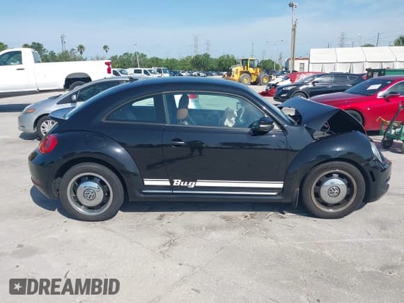✅ 2015 Volkswagen Beetle Fleet Edition • VIN: 3VWF17AT0FM611254 • Lot: 41938190. Listed on IAAI with Not provided. Free auction sales archive from the USA and detailed vehicle history report at DreamBid. Image 12.