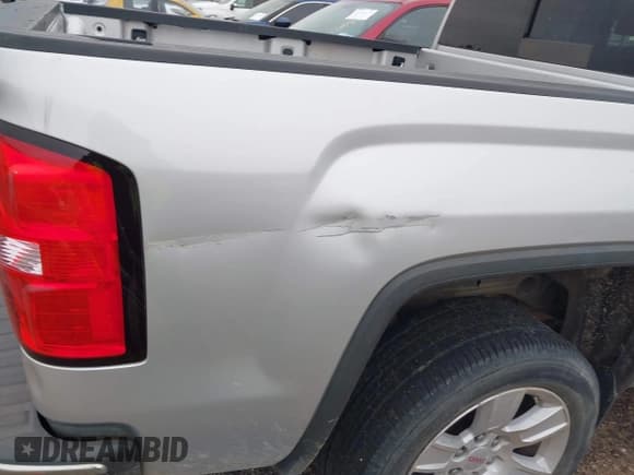 ✅ 2015 GMC Sierra 1500 SLE • VIN: 3GTP1UEC1FG287388 • Лот: 43834556. Опубликован ранее на IAAI с пробегом 206 996 миль. Бесплатный доступ к архиву аукционных продаж из США и подробный отчёт об истории автомобиля на DreamBid. Изображение 17.