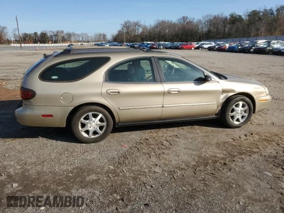 ✅ 2001 Mercury Sable LS Premium • VIN: 1MEHM59S71G644207 • Lot: 84601144. Listed on Copart with 71,236 mi. Free auction sales archive from the USA and detailed vehicle history report at DreamBid. Image 3.