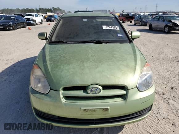 2010 Hyundai Accent GS z VIN KMHCM3AC7AU162841, wystawiony jako Copart lot #82645754 z przebiegiem 102 736 mil mil oraz Czysty tytuł • Clean title. Historia ofert i sprzedaży dostępna na DreamBid. Obrazek 5.