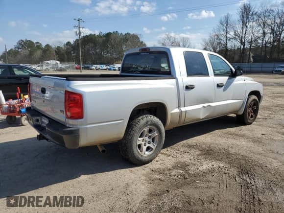 2007 Dodge Dakota ST z VIN 1D7HW28P17S184237, wystawiony jako Copart lot #43230605 z przebiegiem 151 993 mil mil oraz Czysty tytuł • Clean title. Historia ofert i sprzedaży dostępna na DreamBid. Obrazek 3.