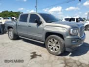 ✅ 2017 GMC Sierra 1500 Denali • VIN: 3GTU2PEJXHG185588 • Lot: 68372695. Listed on Copart with 131,793 mi. Free auction sales archive from the USA and detailed vehicle history report at DreamBid. Image 4.